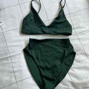 Left on Friday worn ONCE swimsuit. Size M